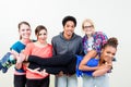 Friends in dance class carrying woman on hands