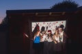 Friends dancing waving with sparklers at New Year`s Eve party Royalty Free Stock Photo