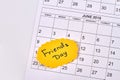 Friends day concept. April calendar on white background.