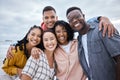 Friends, diversity and portrait at beach, ocean and outdoor nature for fun, happiness and travel. Group of happy young