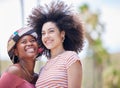Friends, diversity and summer with a black woman and happy friend on holiday outdoor together. Vacation, smile and