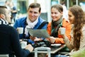 Friends drinking coffee outdoors Royalty Free Stock Photo