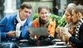 Friends drinking coffee outdoors Royalty Free Stock Photo