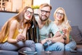Friends drinking wine at home Royalty Free Stock Photo