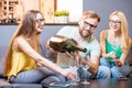 Friends drinking wine at home Royalty Free Stock Photo