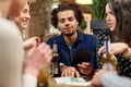 Friends with drinks, money and bill at bar Royalty Free Stock Photo