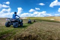 Friends driving off-road with quad bike or ATV and UTV vehicles Royalty Free Stock Photo