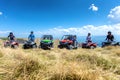 Friends driving off-road with quad bike or ATV and UTV vehicles Royalty Free Stock Photo