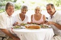 Friends Eating An Al Fresco Lunch Royalty Free Stock Photo