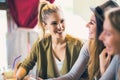 Friends enjoying in conversation and drinking coffee. Royalty Free Stock Photo