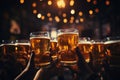 Friends enjoying happy hour at brewery pub closeup of beer glasses food and beverage Royalty Free Stock Photo