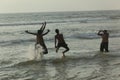 Friends enjoying photography on Panambar beach, October 02,2011, Mangalore, Karnataka, India.