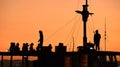 Friends enjoying the sunset in a liveaboard boat in Komodo