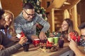 Friends exchanging Christmas presents Royalty Free Stock Photo