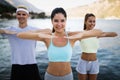 Friends fitness training together outdoors living active healthy Royalty Free Stock Photo