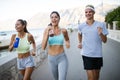 Friends fitness training together outdoors living active healthy Royalty Free Stock Photo