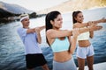 Friends fitness training together outdoors living active healthy Royalty Free Stock Photo