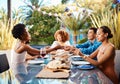 Friends, food and outdoor at a table for celebration, social gathering, happiness on holiday. Diversity, men and women Royalty Free Stock Photo