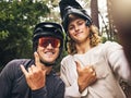 Friends in forest, cool fitness selfie fitness with cycling helmet and smile with hands gesture in Australia. Workout on