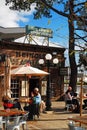 Friends gather for an outdoor drink at HeinholdÃ¢â¬â¢s First and Last Chance,