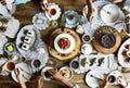 Friends Gathering Together on Tea Party Eating Cakes Enjoyment h Royalty Free Stock Photo