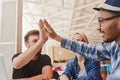 Friends greeting each other with high five Royalty Free Stock Photo