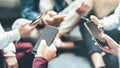 Friends group having addicted fun using mobile smart phone - Close up of people hands sharing content on social media network with Royalty Free Stock Photo