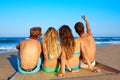 Friends group selfie photo sitting in beach sand