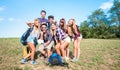 Friends group taking selfie at trekking excursion - Happy friendship and freedom concept with young millenial people having fun