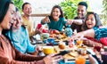 Friends group talking at coffee bar rooftop - Diverse people having fun together at outside cafeteria on brunch time Royalty Free Stock Photo