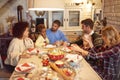 Friends have fun at a family Christmas dinner Royalty Free Stock Photo