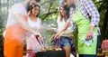 Friends having a barbecue party in nature Royalty Free Stock Photo