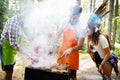 Friends having a barbecue party and fun in nature Royalty Free Stock Photo