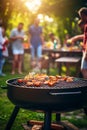 Friends are having a barbecue in the yard. Selective focus. Royalty Free Stock Photo