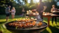 Friends are having a barbecue in the yard. Selective focus. Royalty Free Stock Photo