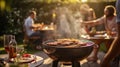 Friends are having a barbecue in the yard. Selective focus. Royalty Free Stock Photo