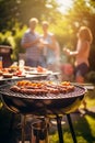 Friends are having a barbecue in the yard. Selective focus. Royalty Free Stock Photo