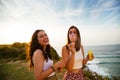 Friends having fun blowing bubbles Royalty Free Stock Photo