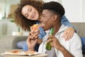 friends having fun drinking beer and eating pizza Royalty Free Stock Photo