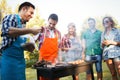 Friends enjoying bbq party and having fun Royalty Free Stock Photo