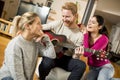 Friends having fun with guitar Royalty Free Stock Photo