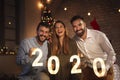 Friends having fun at New Years Eve party Royalty Free Stock Photo