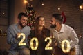 Friends having fun at New Years Eve party Royalty Free Stock Photo