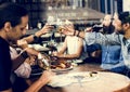 Friends having lunch time together Royalty Free Stock Photo