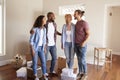 Friends Helping Couple To Move Into New Home