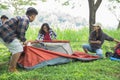 Friends hiker setting up the tent Royalty Free Stock Photo