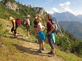 Friends hiking in mountains Royalty Free Stock Photo