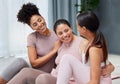 Friends, hug and yoga on a floor, bonding and relax, exercise and meditation, happy and smile while embracing. Women Royalty Free Stock Photo