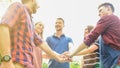 Friends join hand together during at barbecue in nature Royalty Free Stock Photo