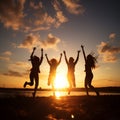 Friends jumping on sandy beach at idyllic sunset. Success concept, Hello summer concept Royalty Free Stock Photo